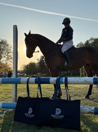 stable tote in front of rider